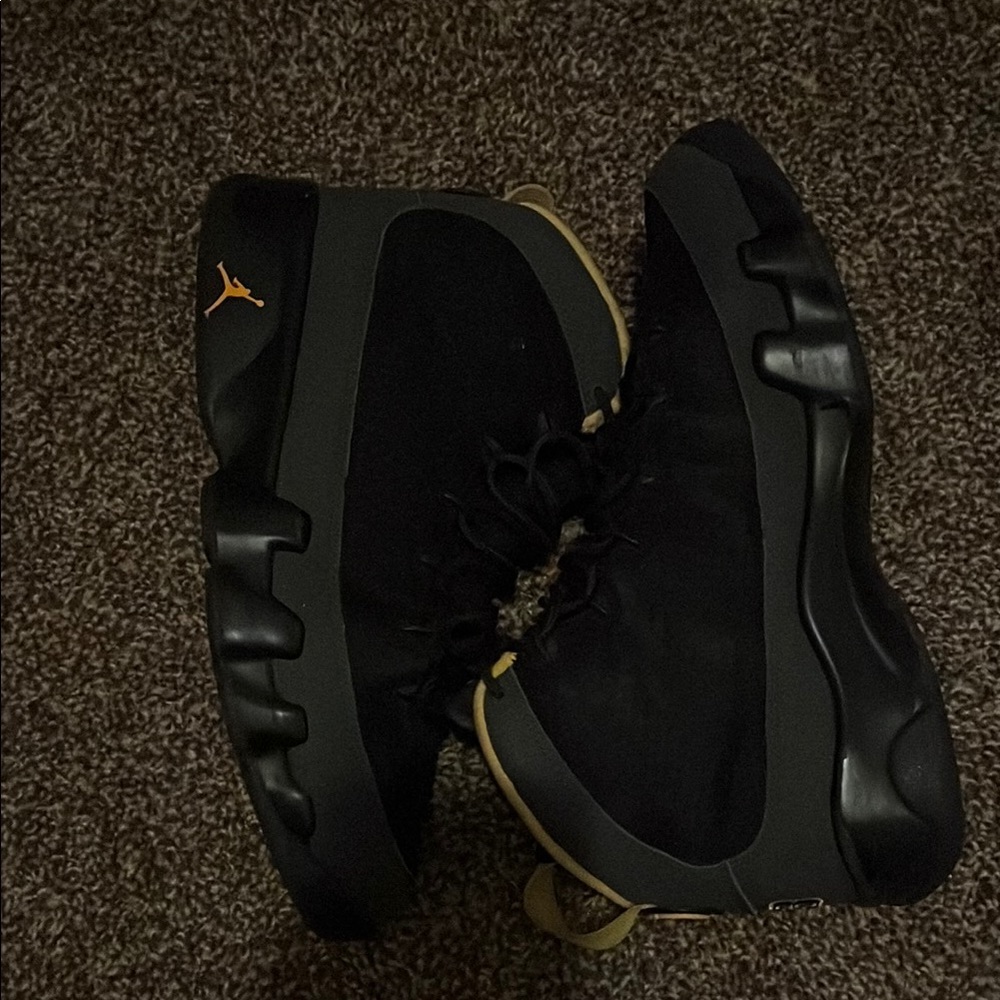 Air Jordan Black and Gold Sneakers